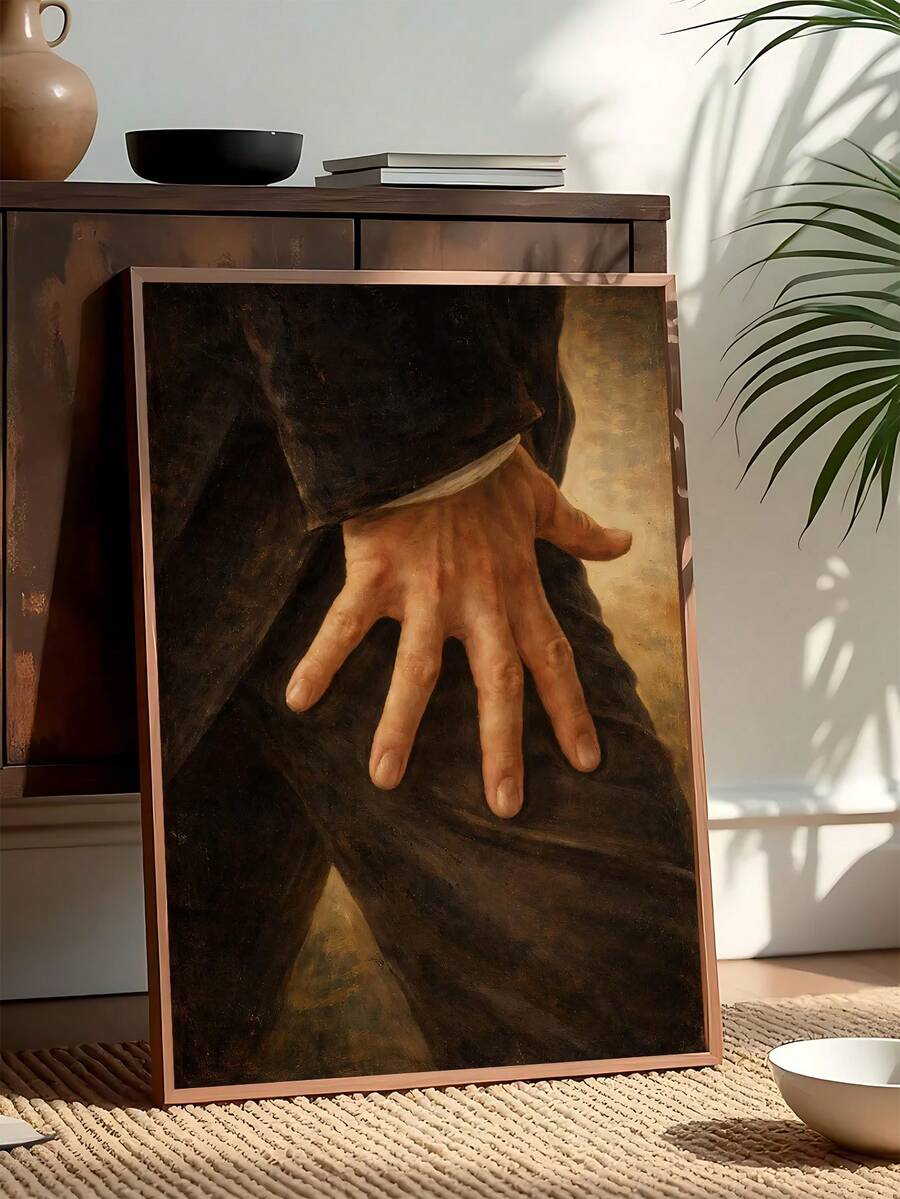Vintage Pride And Prejudice canvas wall art with hand over dark fabric.