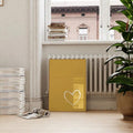 Yellow love poster leaning near sofa and window