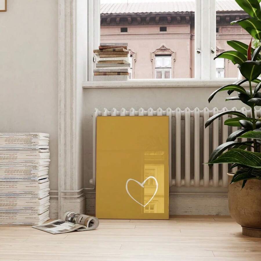 Yellow love poster leaning near sofa and window