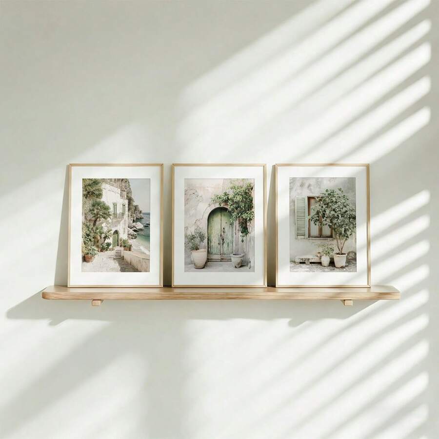 Mediterranean village art set resting on minimalist wood shelf