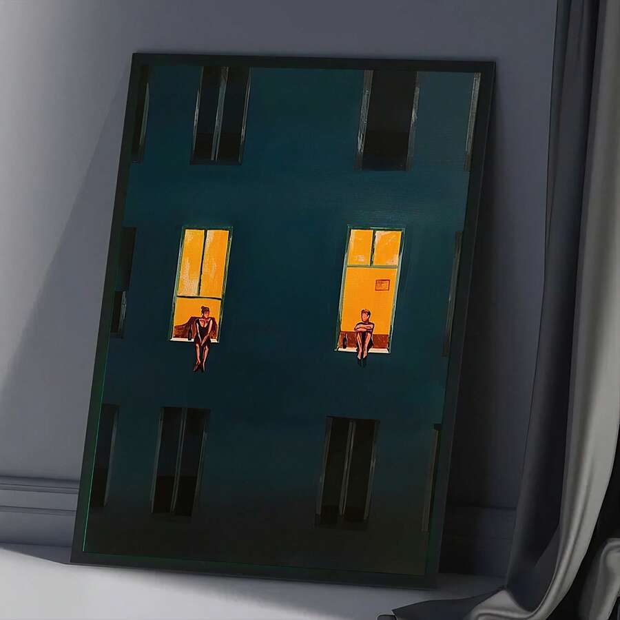 Modern canvas decor with dark teal city facade gold frame and cozy night atmosphere