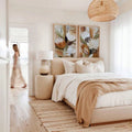 Earthy botanical diptych with cream rust and sage flowers in bedroom