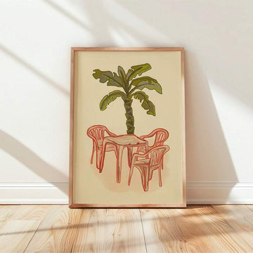 Palm tree with coral retro patio chairs and cafe table