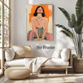 Female fashion portrait wall art displayed above a white sofa and woven ottoman