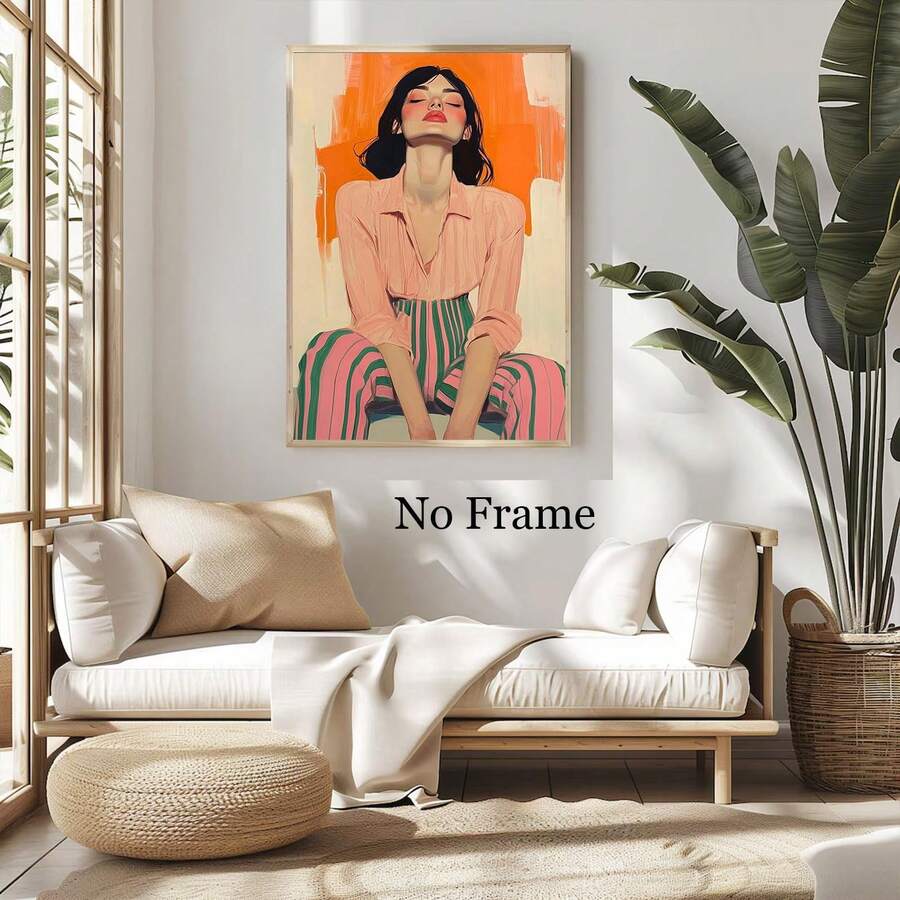 Female fashion portrait wall art displayed above a white sofa and woven ottoman