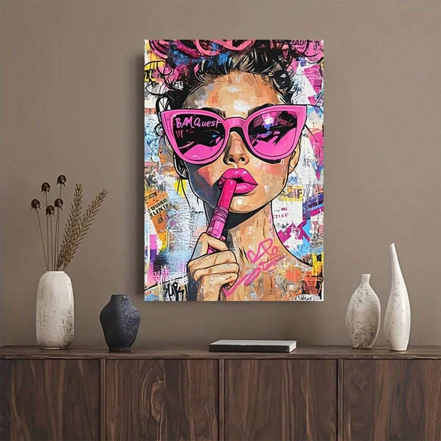 Transform your space with this vibrant pop art canvas poster featuring a cool girl in pink glasses. The bold, eye-catching design combines cartoon, figure, and graphic elements in a modern aesthetic that brings personality to any room. Crafted on durable canvas with waterproof properties, this unframed piece is perfect for trendy home decor. Easy to display and built to last, it's an instant statement for contemporary interiors.