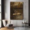 Romantic two swans wall art displayed beside a modern cream armchair