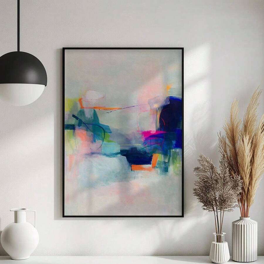 Pastel abstract print in black frame with white vases and dried grass