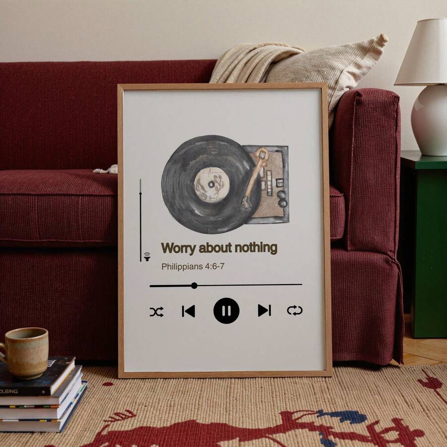 Framed Worry about nothing Philippians 4:6-7 music player poster leaning in bright living room