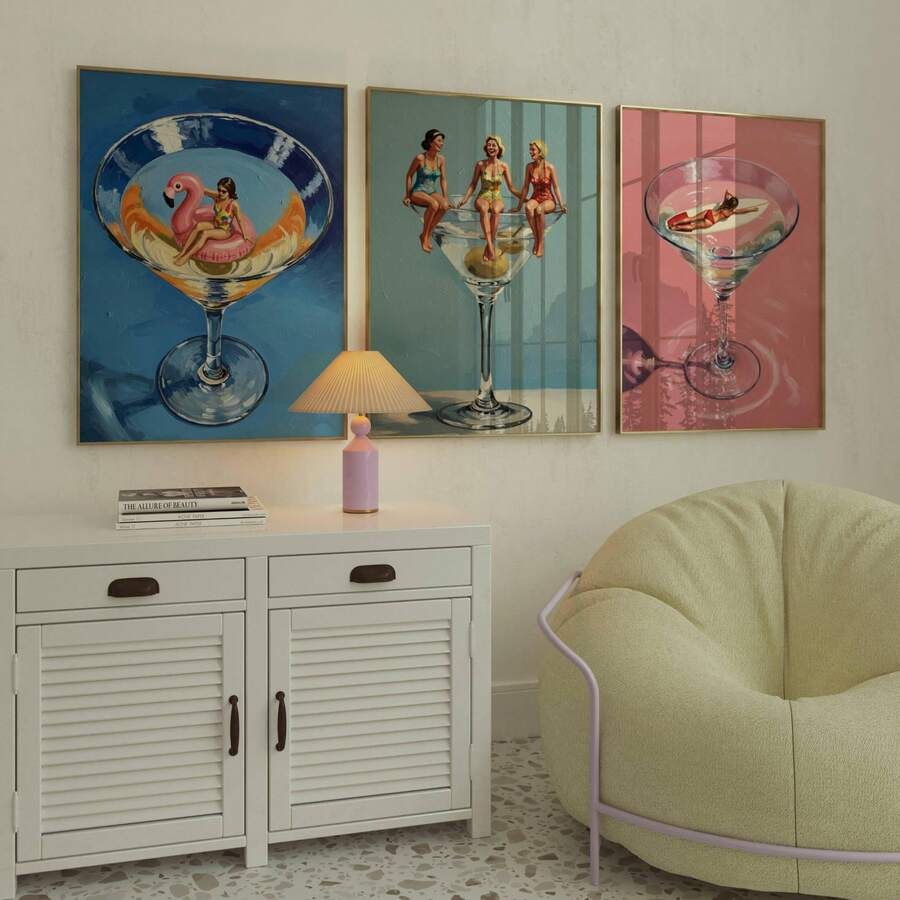 Three piece retro cocktail canvas poster set displayed above a console