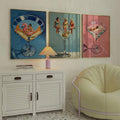Vintage martini pool party wall art trio in a living room