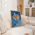 Blue cocktail poster with flamingo float and swimmer in a framed display