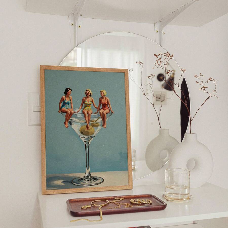 Aqua cocktail poster with three women sitting on a martini glass