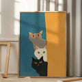 Modern gray white and black cat canvas poster displayed near a bright curtain