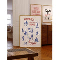 Sunny typography artwork grouped with eclectic framed prints
