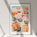 Coastal beach wall art with striped umbrellas and seaside view