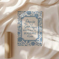 Frameless blue botanical Doxology canvas poster in sunlit beige interior
