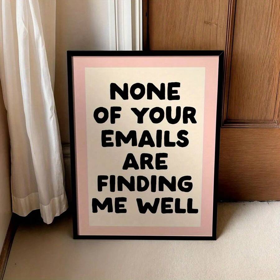 Black frame mockup of retro email quote wall art beside curtain and cabinet