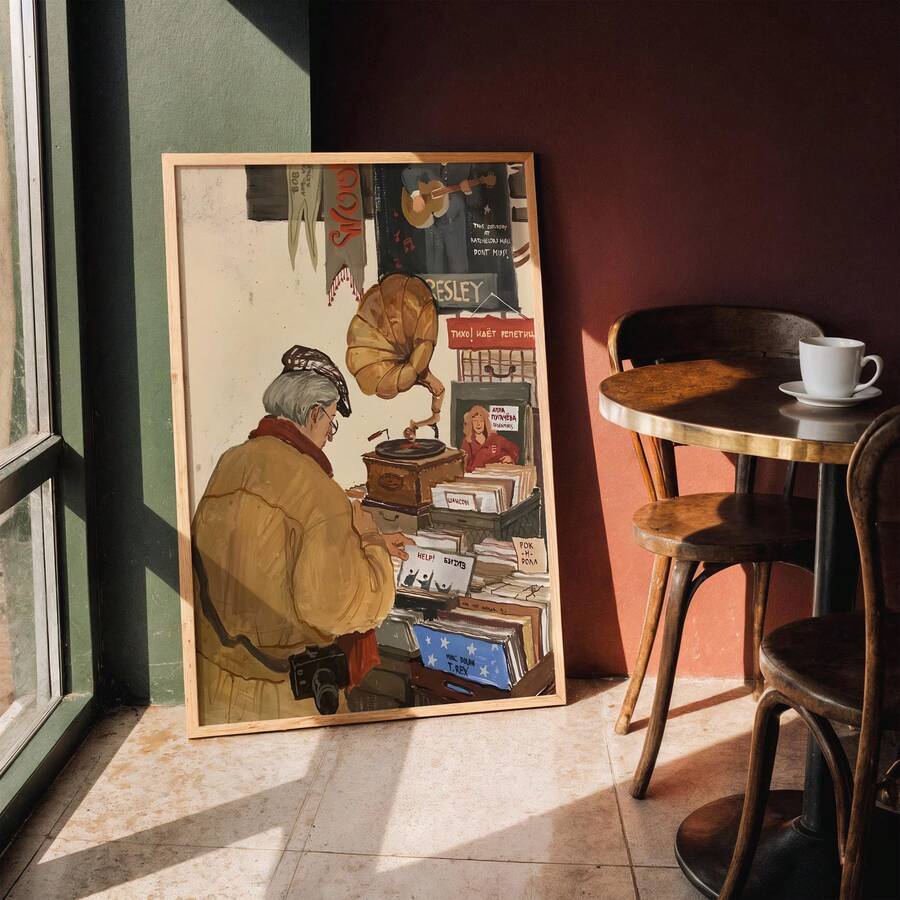 Framed vinyl record wall art showing older man browsing records in vintage music shop
