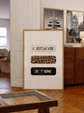 C EST LA VIE and JE T AIME French text print with leopard pattern in a gold frame