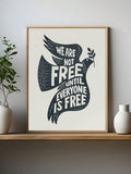 Framed peace dove freedom quote poster on minimal console with vases