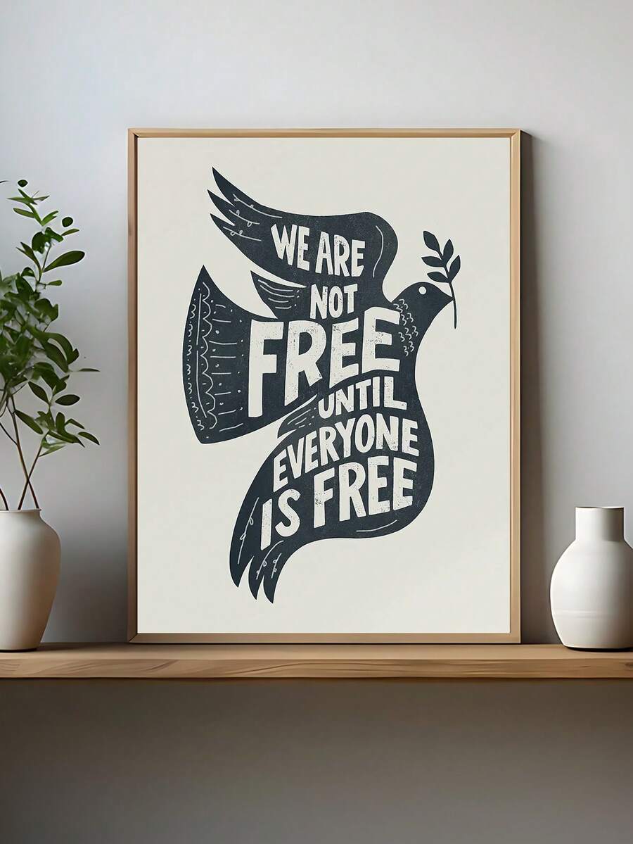 Framed peace dove freedom quote poster on minimal console with vases