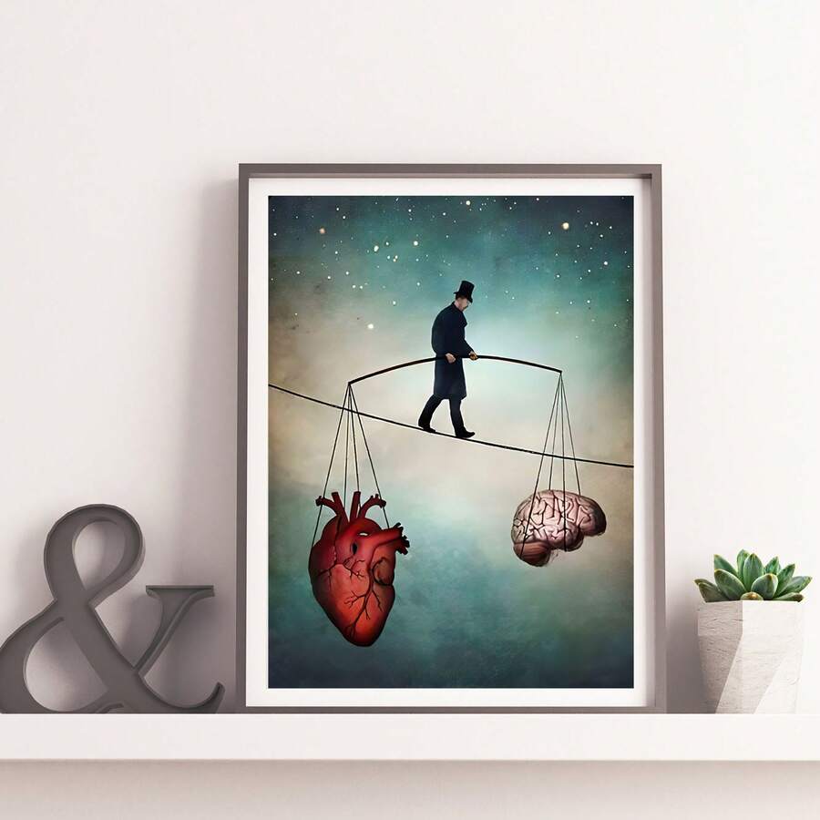 Surreal heart brain balance art in white mat frame on shelf with plant and ampersand decor