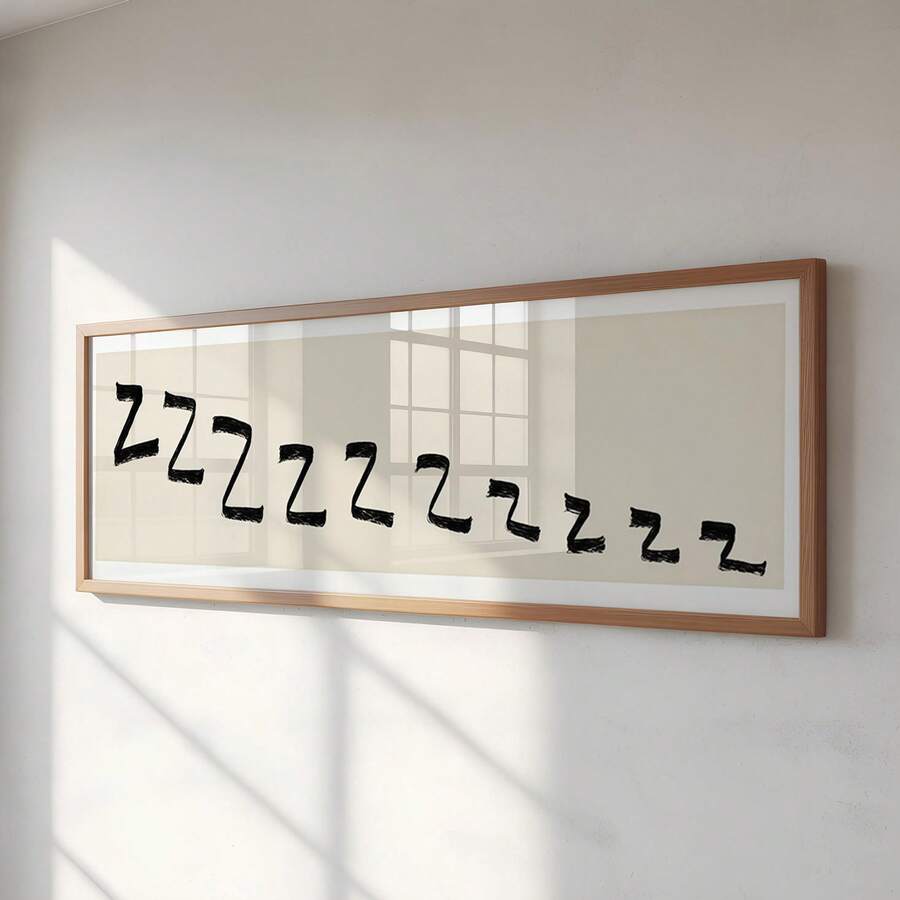 Framed horizontal Zzz sleep typography print with black brush letters on cream background