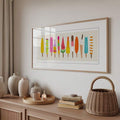 canvas option view of Panoramic framed wall art print with colorful popsicles and ice cream bars in bright yellow, pink, orange, teal, green and retro summer style.