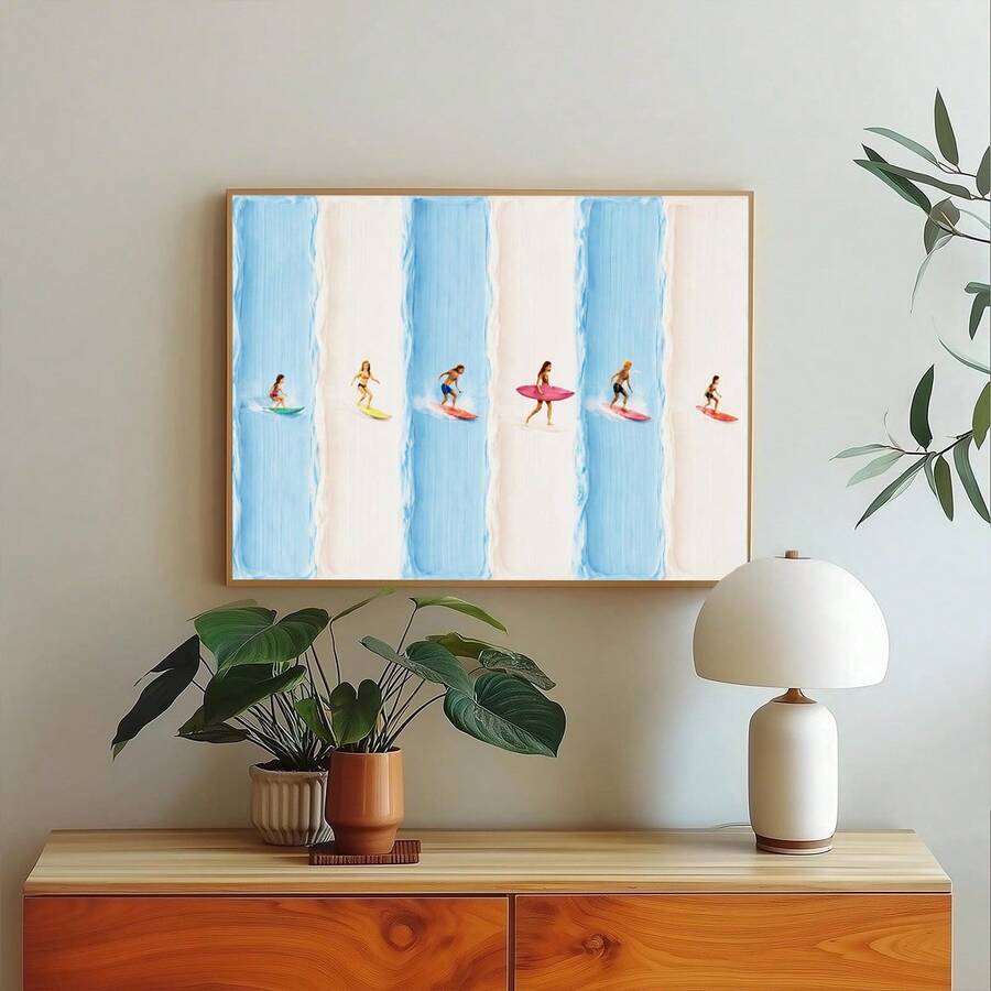 Blue striped surfer artwork above a light wood console and houseplants