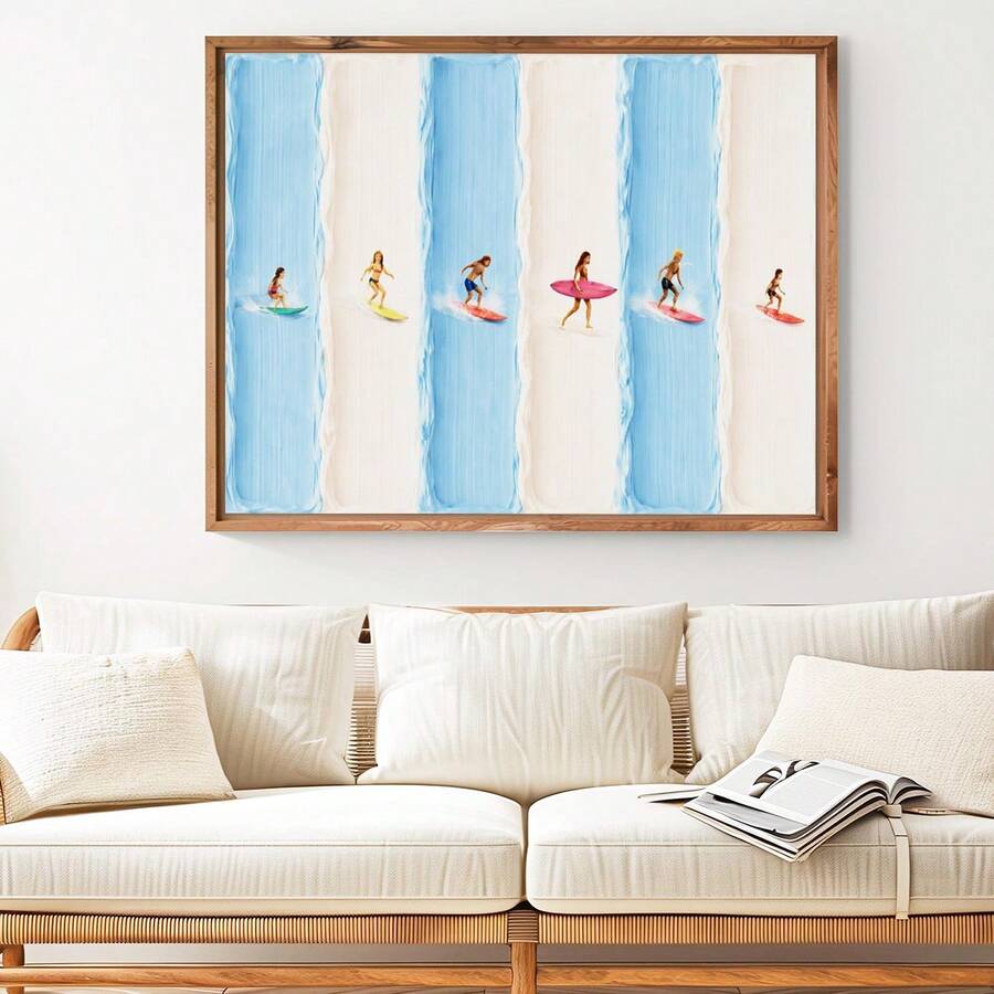 Framed summer surfer print above a white sofa with natural wood accents