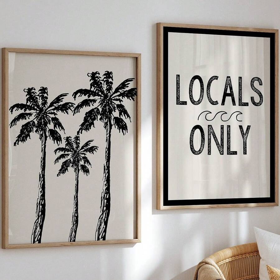 Framed palm tree line art and Locals Only wave lettering on an ivory wall
