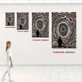 Colorful geometric vortex canvas shown in four sizes on a bright wall