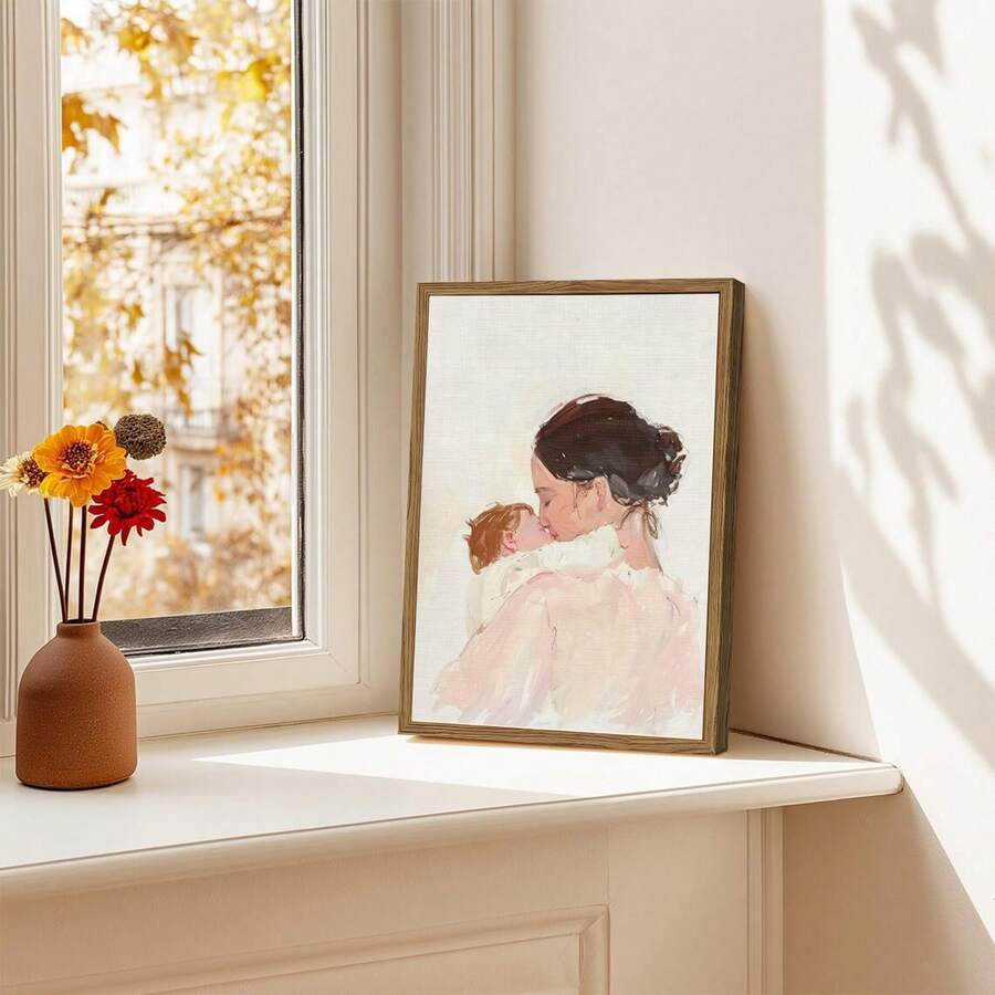 Mother and baby watercolor family poster displayed beside a window and flowers