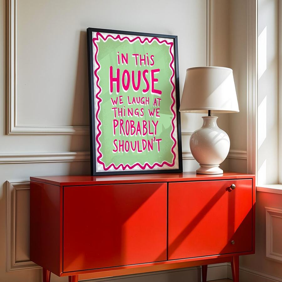 Bring warmth and laughter into your home with this charming pink and green quote wall art. Featuring the uplifting message "We Laugh in This Home," this retro-inspired canvas decoration adds personality and joy to any living space. The modern graphic design works beautifully in home offices, bedrooms, or living rooms, creating an inviting atmosphere that celebrates life's lighter moments. Available as both framed and unframed options, this waterproof canvas piece is durable and easy to display. Perfect for 