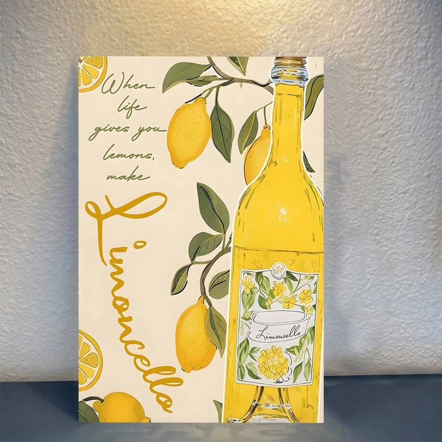 Cream and yellow limoncello poster with green leaves and lemon illustrations leaning against a textured wall
