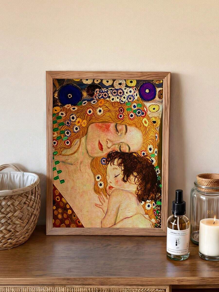 Golden floral mother and child poster displayed on a console table