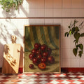 Cherry still-life canvas in a wood frame styled on a patterned kitchen counter