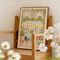 Citrus fruit storefront wall art displayed on a wood chair