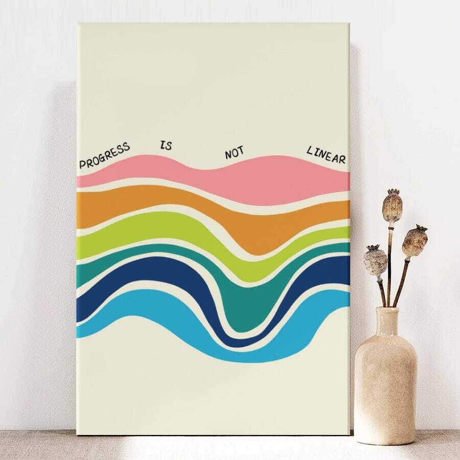 Transform your space with this vibrant motivational canvas art featuring the empowering message "Progress Is Not Linear." Perfect for bedrooms, living rooms, offices, and beyond, this piece combines vintage-inspired design with contemporary color palettes to inspire daily. Crafted on premium canvas with a sturdy frame, this water-resistant artwork withstands moisture and humidity. The removable design makes it easy to reposition or relocate whenever you refresh your décor. Whether you're seeking to motivate