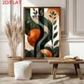 Framed botanical geometric print beside dried grasses on a light console table