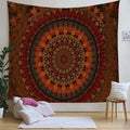 Rust orange mandala tapestry hanging in minimalist bedroom corner