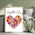 Framed floral heart canvas poster beside a bed with green bedding