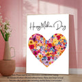 Floral heart Mother’s Day wall art in a bright pink room
