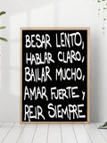 Framed black quote canvas styled in a bright neutral room