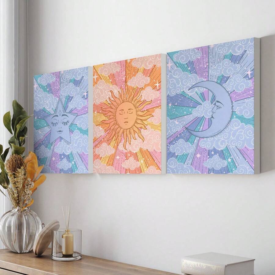 Pastel celestial triptych displayed above a console with plants and decor