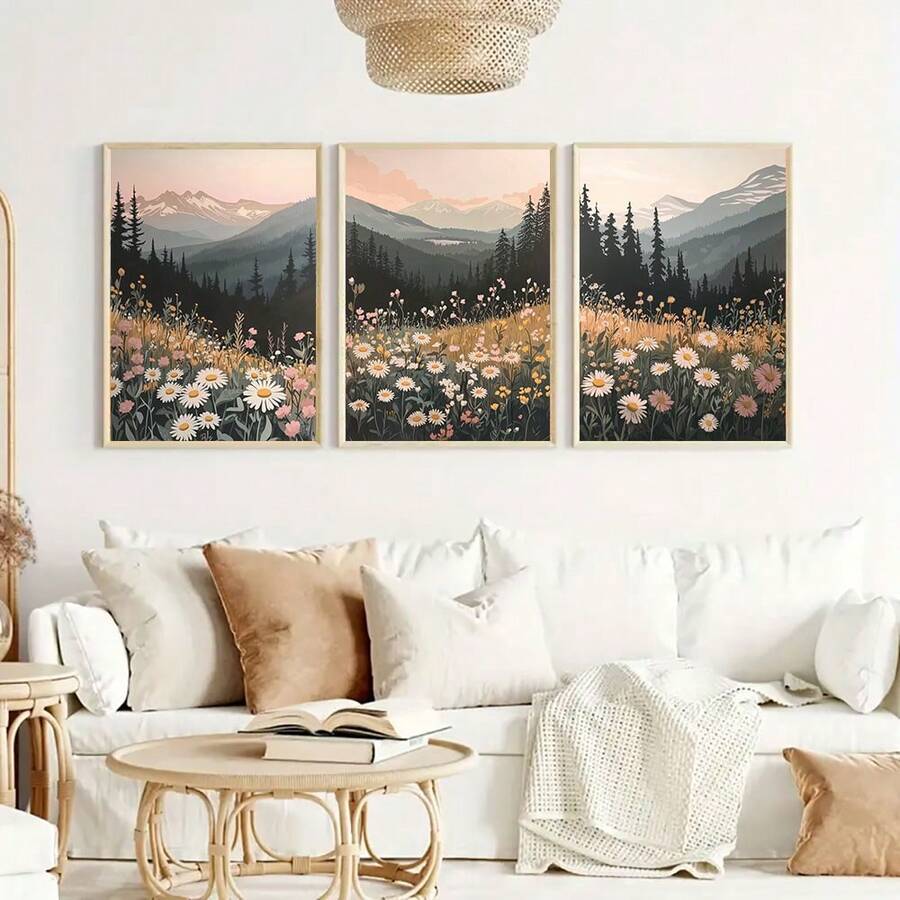 Blush sunset mountain triptych above a bright neutral sofa
