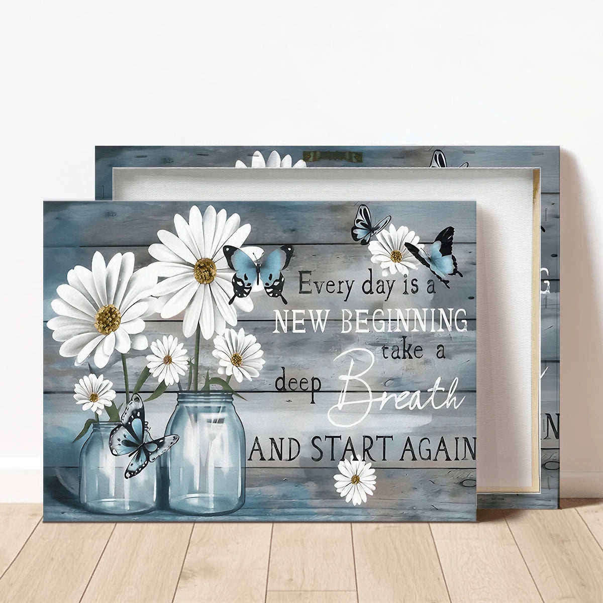 Layered front and reverse canvas previews showing white daisies, blue butterflies, glass jars and inspirational lettering