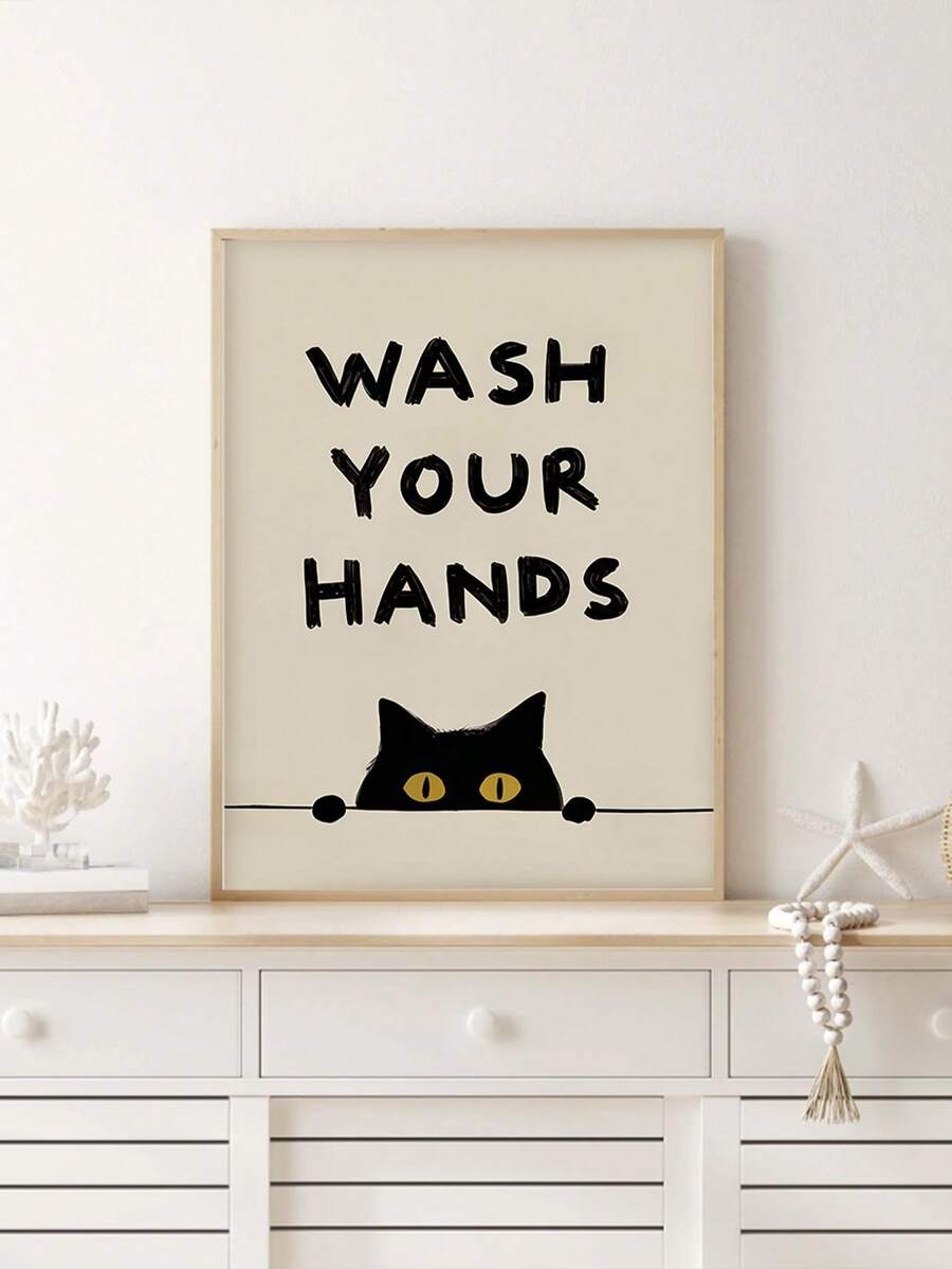 Sage green WASH YOUR HANDS cat canvas styled on bathroom shelf with towels and plant