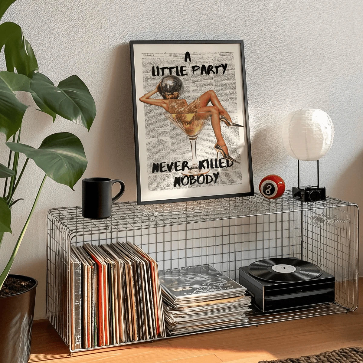 Retro disco poster styled beside vinyl records in a music corner